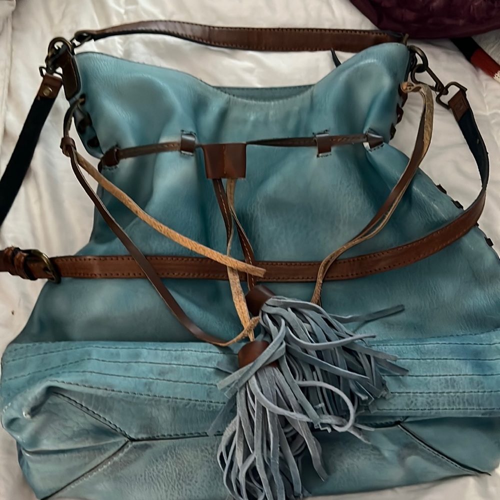 Moda Luxe bag. Beautiful color and fun! Never used